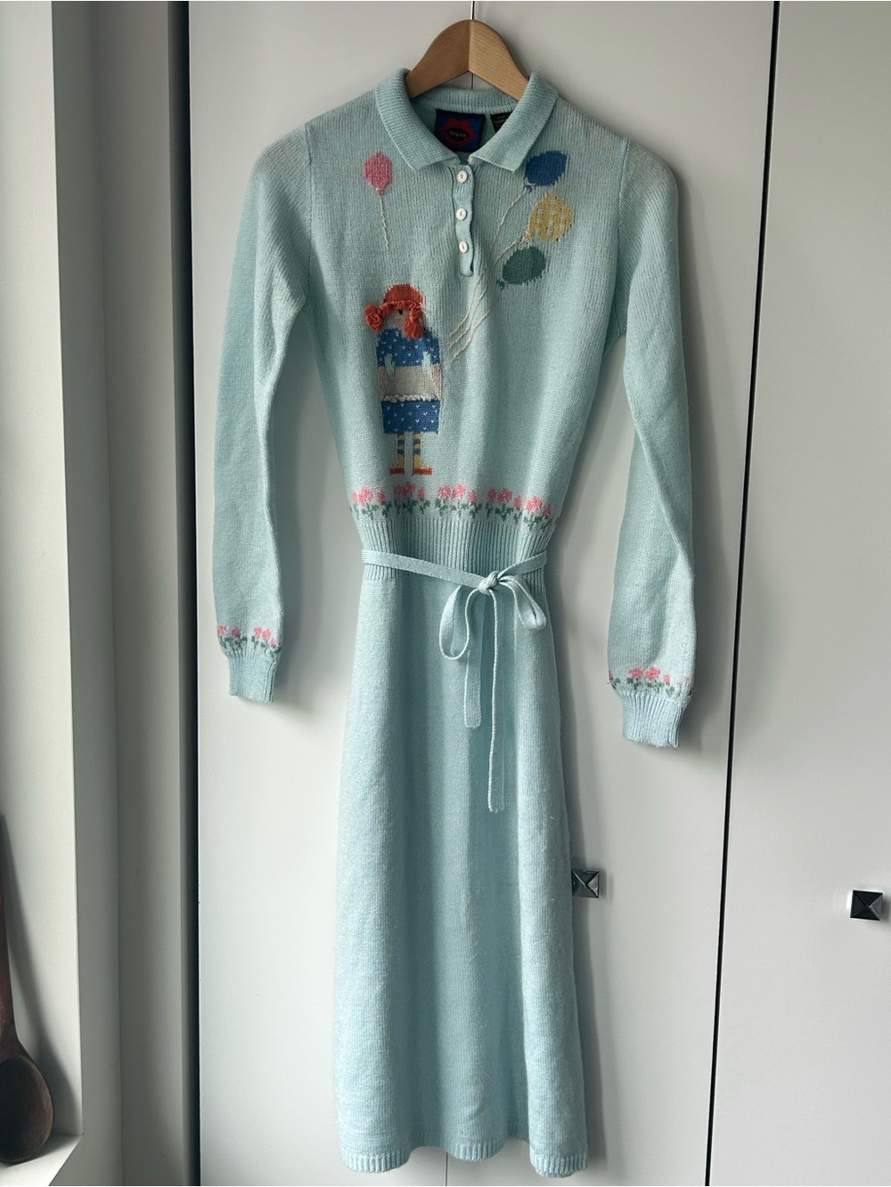 Light Blue Knit Midi Dress with Balloon Girl Motif